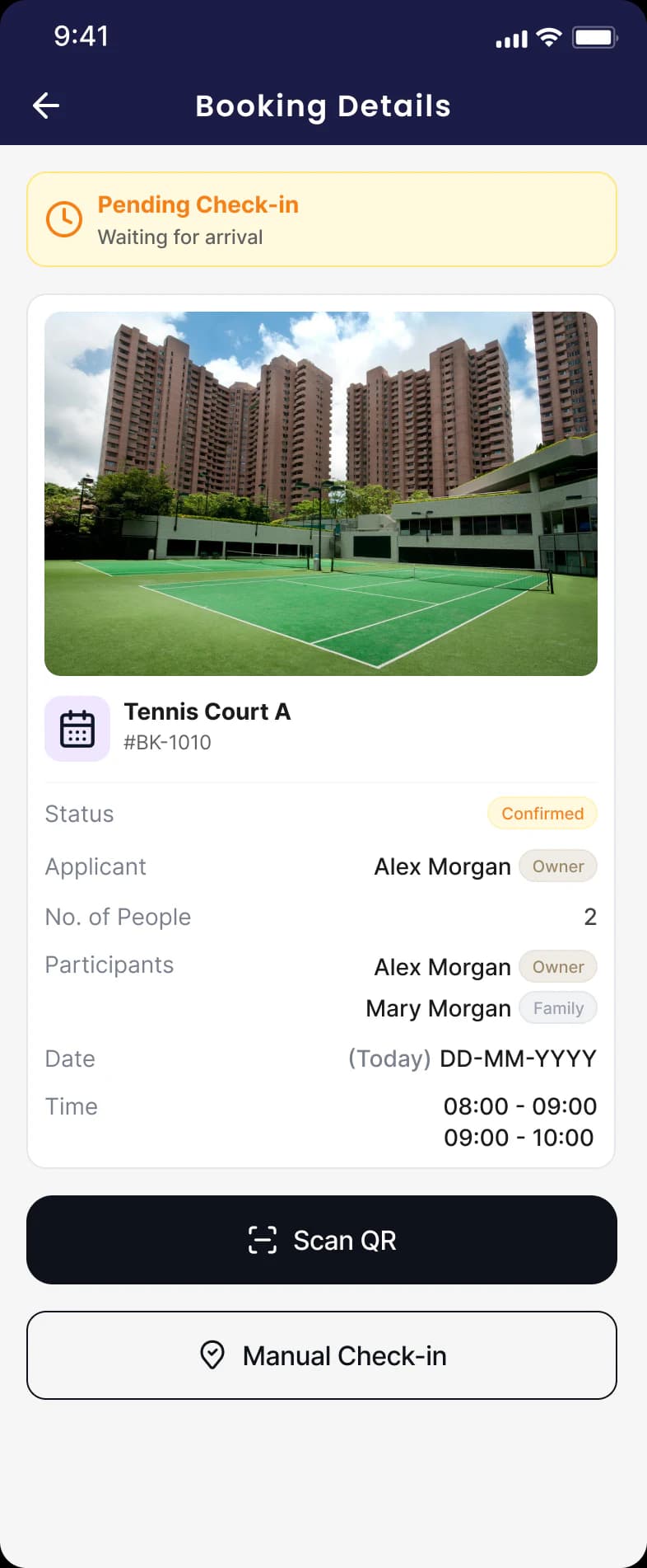 Sportshub staff reviewing facility bookings before check-in